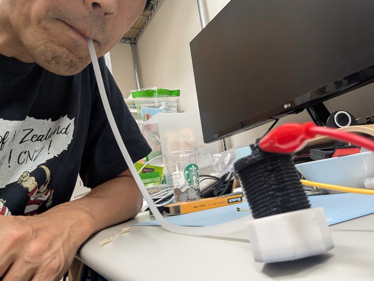 呼吸入力ボタンの使用風景