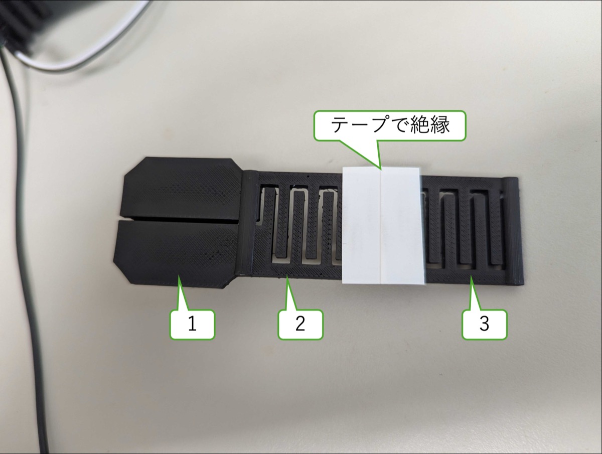テープで絶縁して、1回のなぞりで3回入力できるようにした例